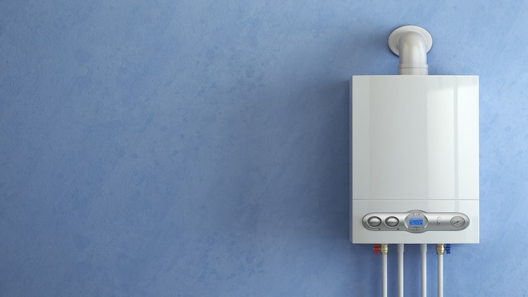 A tankless water heater on a wall