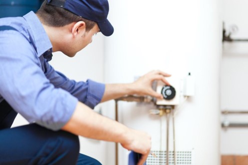 Plumber identifying water heater problems for homeowners who need Einstein Pros.